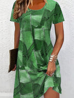 Plus size women's digital print denim-look short sleeve dress, casualwear by Plush Fashion Hub, displayed on a model.