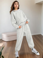 Plus size women's lounge set with oversized hoodie and baggy sweatpants from Plush Fashion Hub, casualwear for comfortable style.