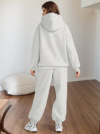 Women’s plus size lounge set with oversized hoodie and baggy sweatpants by Plush Fashion Hub, casualwear for relaxed comfort.