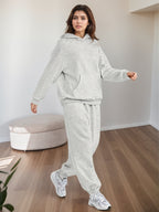 Plus size women's lounge set with oversized hoodie and baggy sweatpants from Plush Fashion Hub, perfect for casual, relaxed wear.