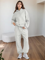 Plus size women's lounge set with oversized hoodie and baggy sweatpants by Plush Fashion Hub, casualwear for comfortable everyday wear.