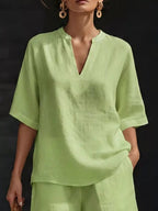 Plus size women's lounge set with notched collar half-sleeve top and matching shorts, comfortable and stylish clothing set.