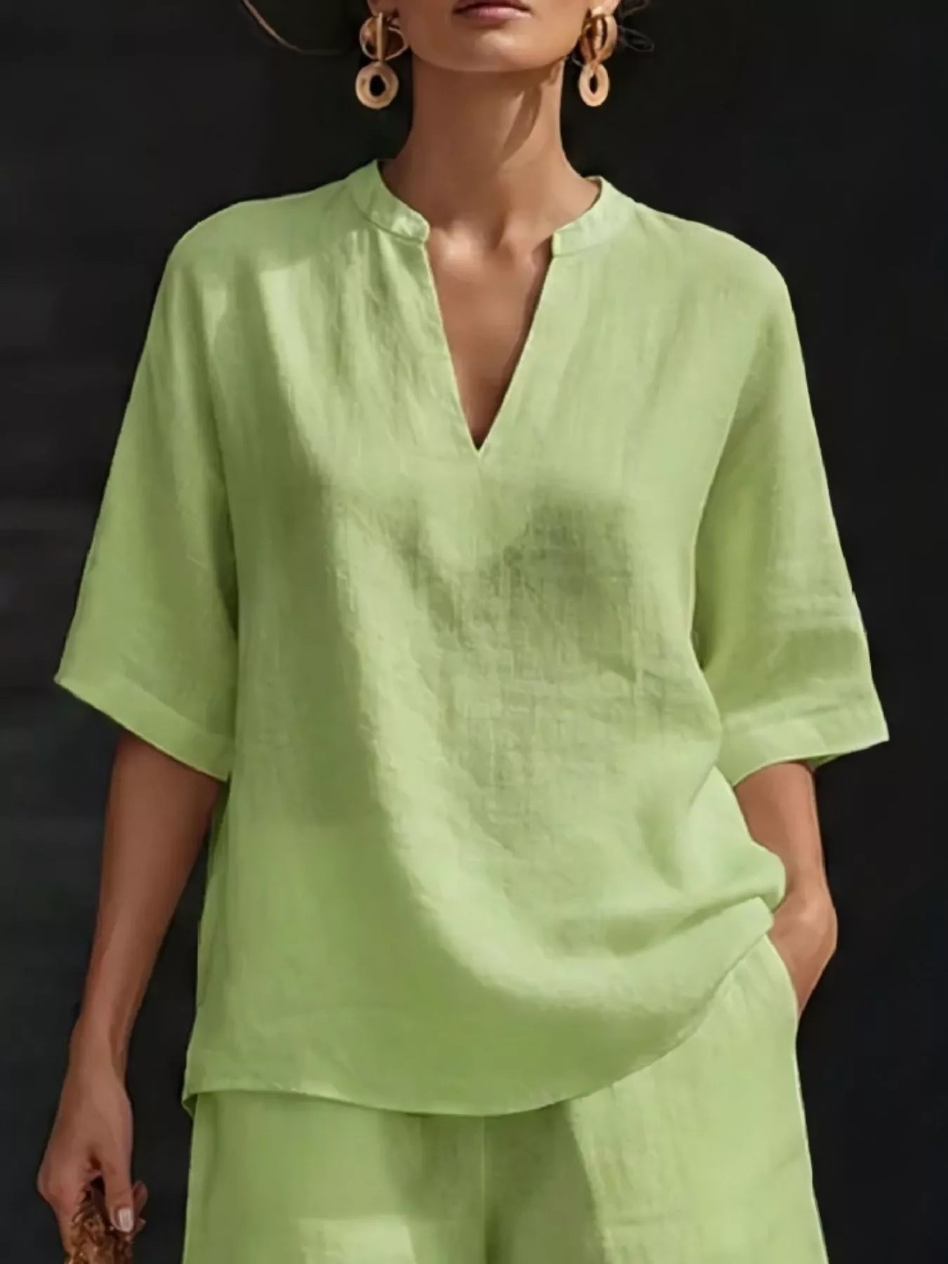 Plus size women's lounge set with notched collar half-sleeve top and matching shorts, comfortable and stylish clothing set.