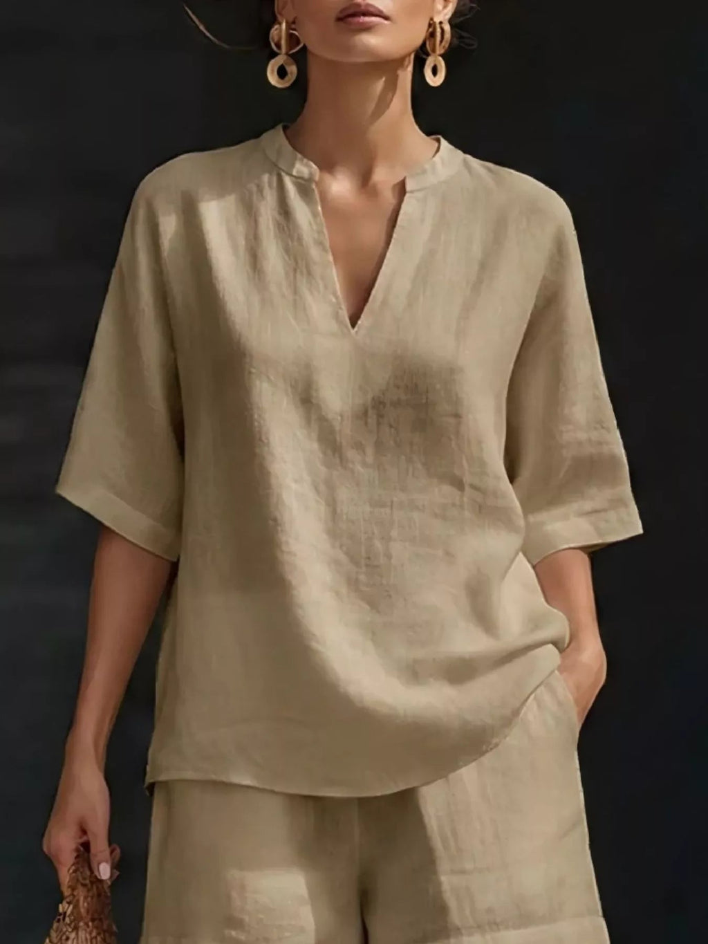 Plus size women's lounge set with notched collar half-sleeve top and matching shorts, comfortable and stylish clothing set.