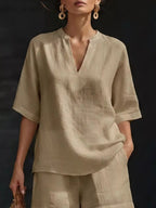 Plus size women's lounge set with notched collar half-sleeve top and matching shorts, comfortable and stylish clothing set.