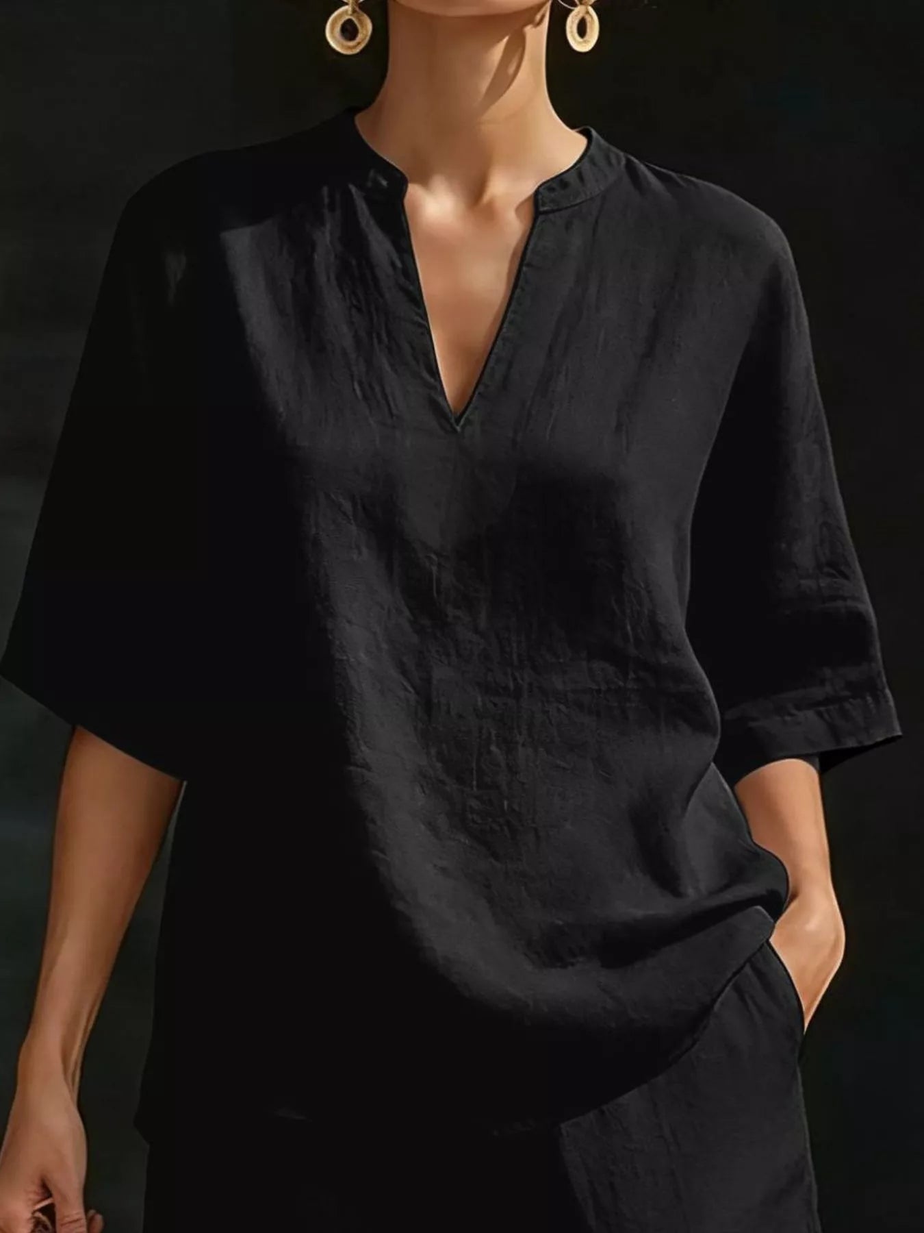 Plus size women's lounge set with notched collar half sleeve top and matching shorts, comfortable and stylish clothing set.