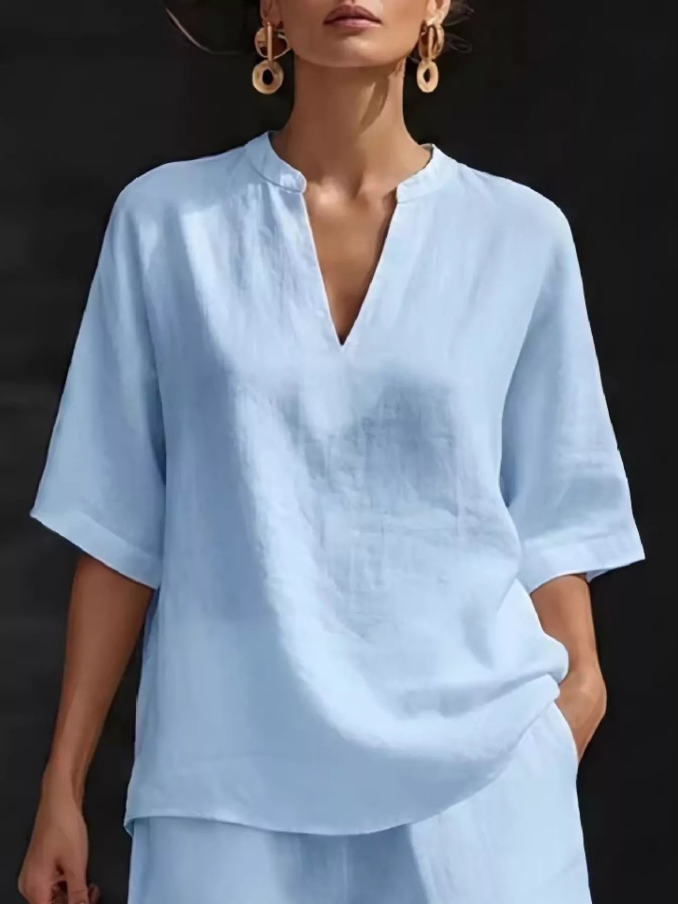 Plus size women's lounge set with notched collar half sleeve top and matching shorts, casual comfortable clothing set.