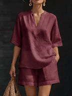 Plus size women's lounge set with notched collar half-sleeve top and matching shorts, comfortable casual clothing by Trendsi.