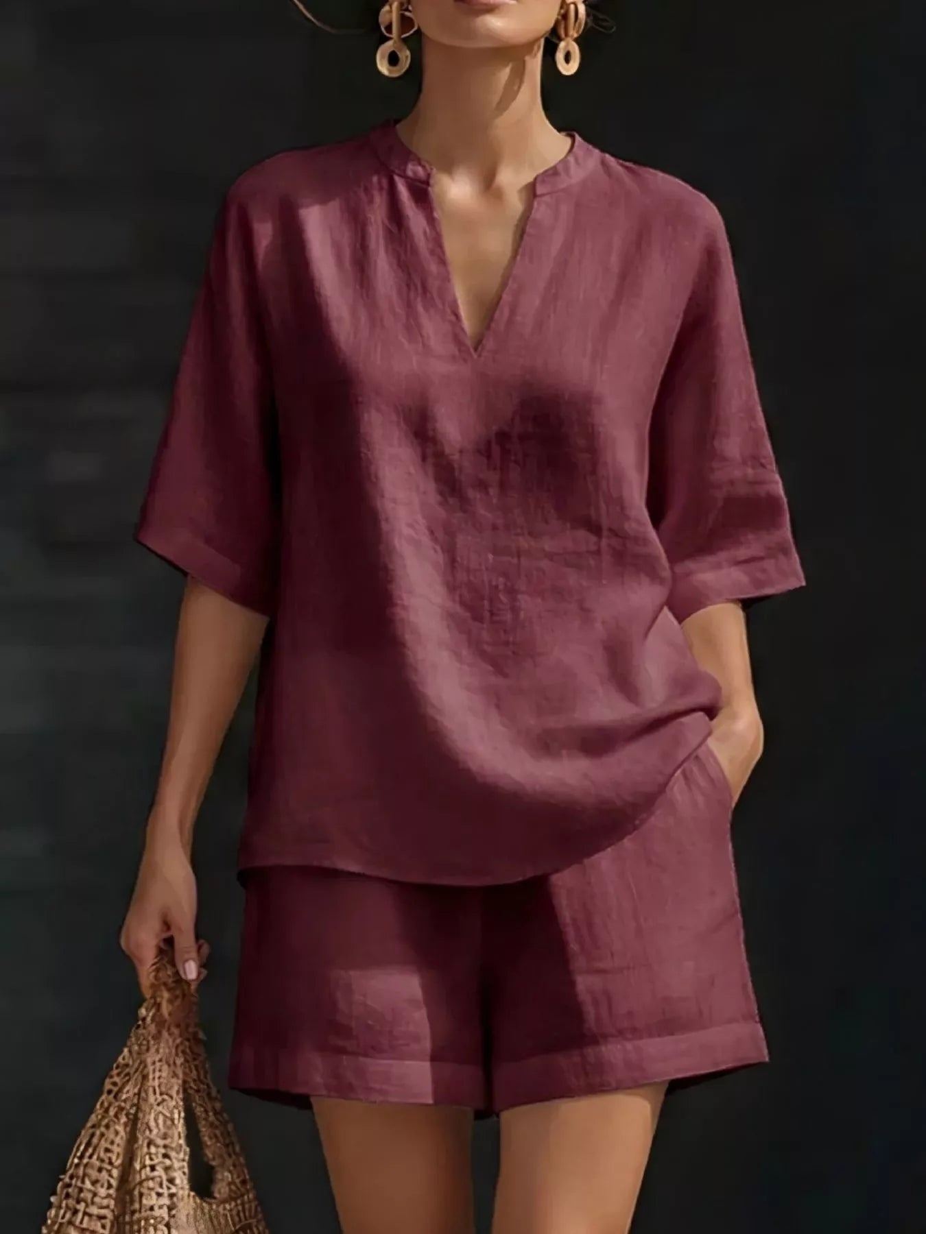 Plus size women's lounge set with notched collar half-sleeve top and matching shorts, comfortable casual clothing by Trendsi.