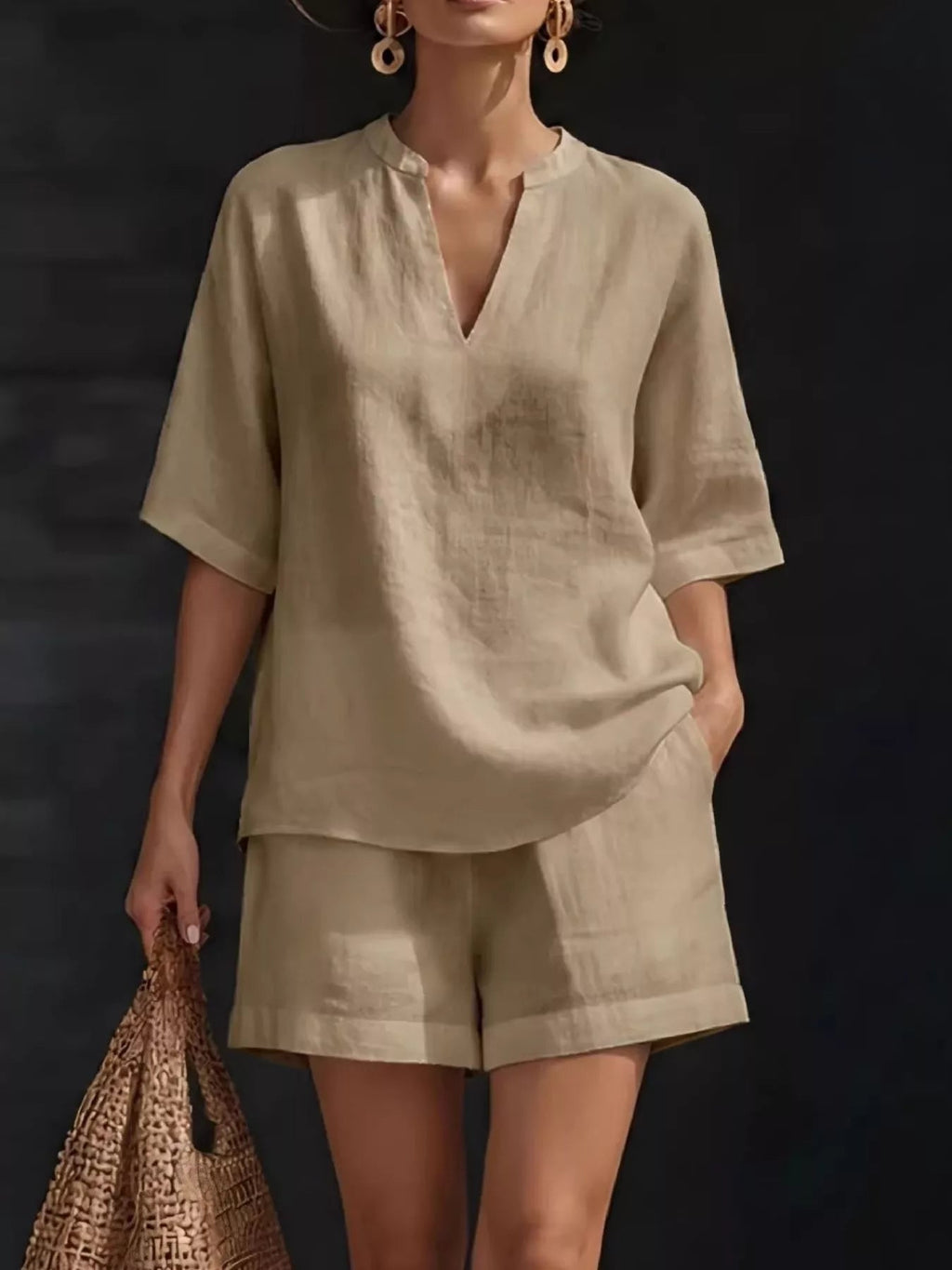 Plus size women's lounge set with notched collar half sleeve top and matching shorts, comfortable and stylish clothing set by Trendsi.