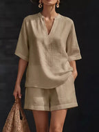 Plus size women's lounge set with notched collar half sleeve top and matching shorts, comfortable and stylish clothing set by Trendsi.