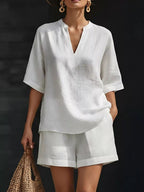 Women's plus size lounge set with notched collar half sleeve top and matching shorts, comfortable clothing set by Trendsi.