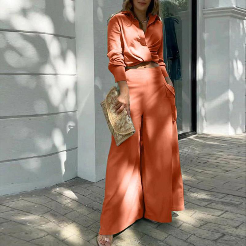 Plus size women's wide-leg elegant pant set by Plush Fashion Hub, casualwear with flowing wide-leg trousers and coordinated top.