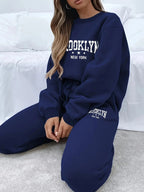 Women’s plush hoodie and pants sweater set by Plush Fashion Hub, cozy winter tracksuit in soft, warm fabric.