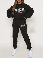 Women’s plush hoodie and pants sweater set by Plush Fashion Hub, cozy winter tracksuit with soft fabric and comfortable fit.