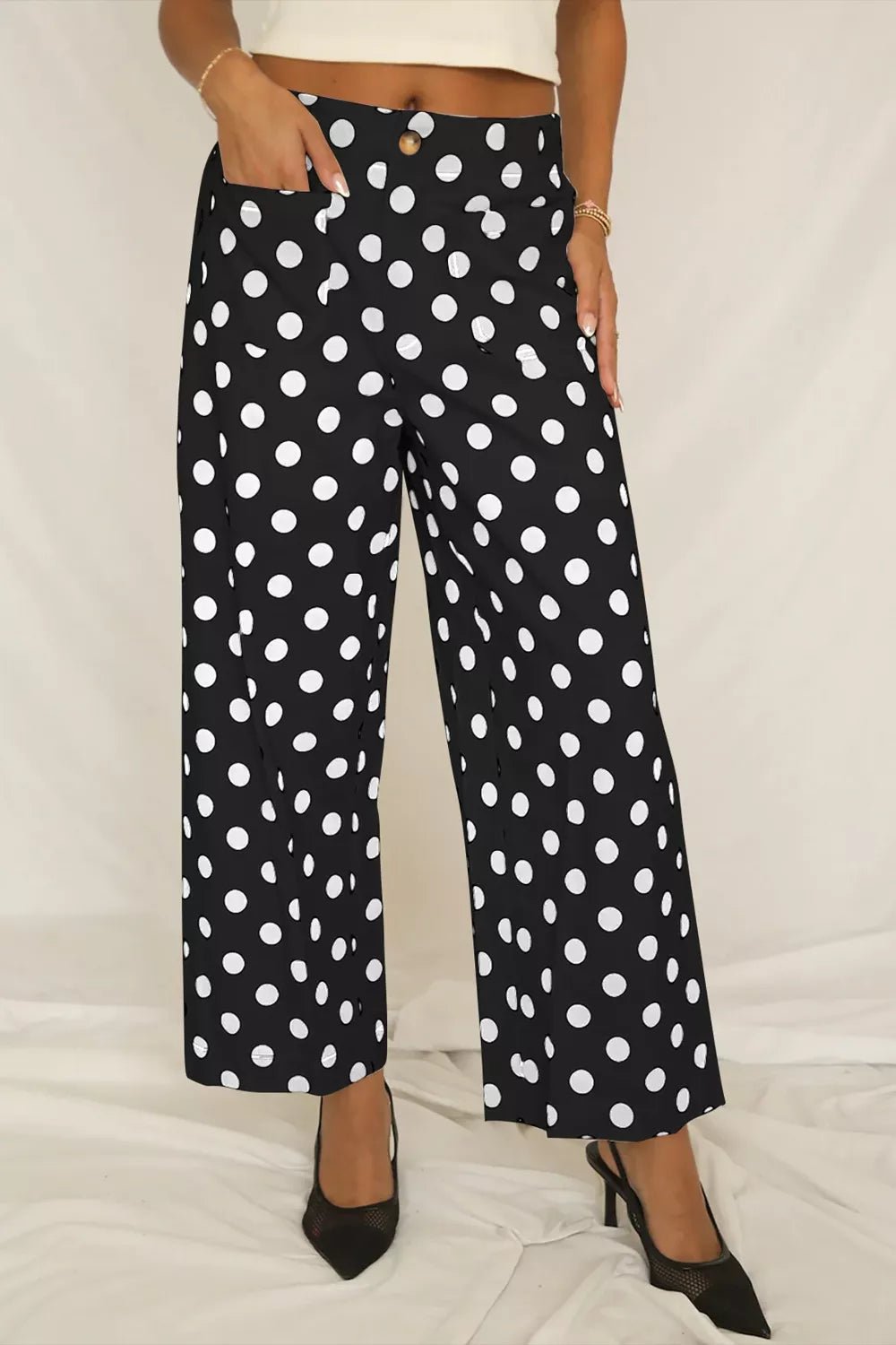 Women's polka dot straight leg pants with pockets by Plush Fashion Hub, featuring a comfortable fit and stylish design.