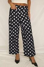 Women's polka dot straight leg pants with pockets by Plush Fashion Hub, featuring a comfortable fit and stylish design.