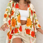 Women’s printed cardigan top with drop shoulder sleeves, casualwear by Plush Fashion Hub, shown on a model.