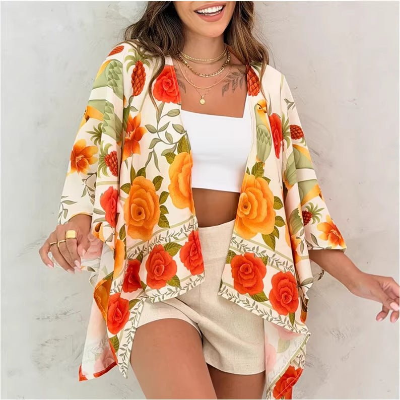 Women’s printed cardigan top with drop shoulder sleeves, casualwear by Plush Fashion Hub, featuring colorful floral print and relaxed fit.