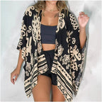 Women’s printed cardigan top with drop shoulder sleeves, casualwear by Plush Fashion Hub, shown in a stylish, comfortable fit.