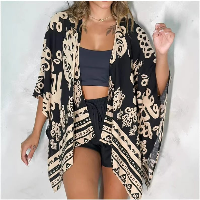 Women’s printed cardigan top with drop shoulder sleeves, casualwear by Plush Fashion Hub, shown in a stylish, comfortable fit.