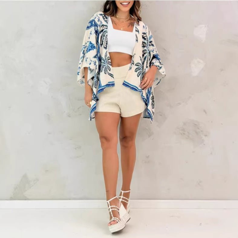 Women’s printed cardigan top with drop shoulder sleeves, casual wear by Plush Fashion Hub, seen in soft fabric and colorful print.