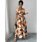 Women’s printed puff sleeve dress with blouse collar and cross-tie waist, casualwear by Plush Fashion Hub.
