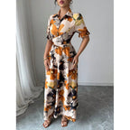Women’s printed puff sleeve casual dress with blouse collar and cross-tie waist, by Plush Fashion Hub.