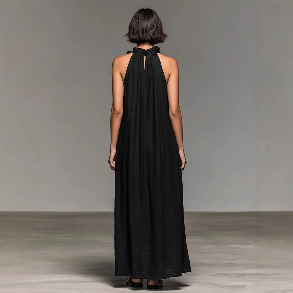 Women's ruffled halterneck sleeveless open-back maxi dress by Plush Fashion Hub, perfect casualwear for resort or summer wear.