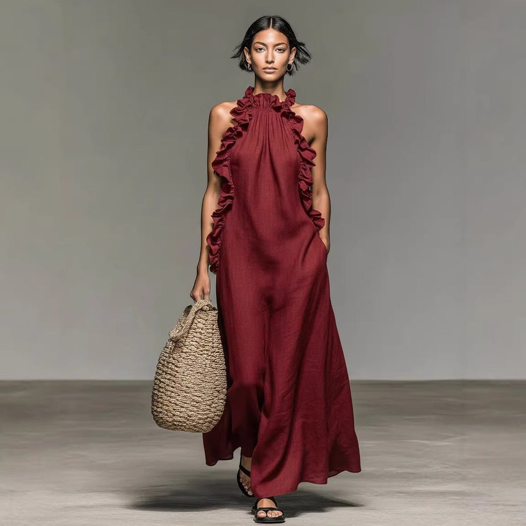 Women's ruffled halterneck sleeveless open-back maxi dress by Plush Fashion Hub, perfect for casual resort wear.