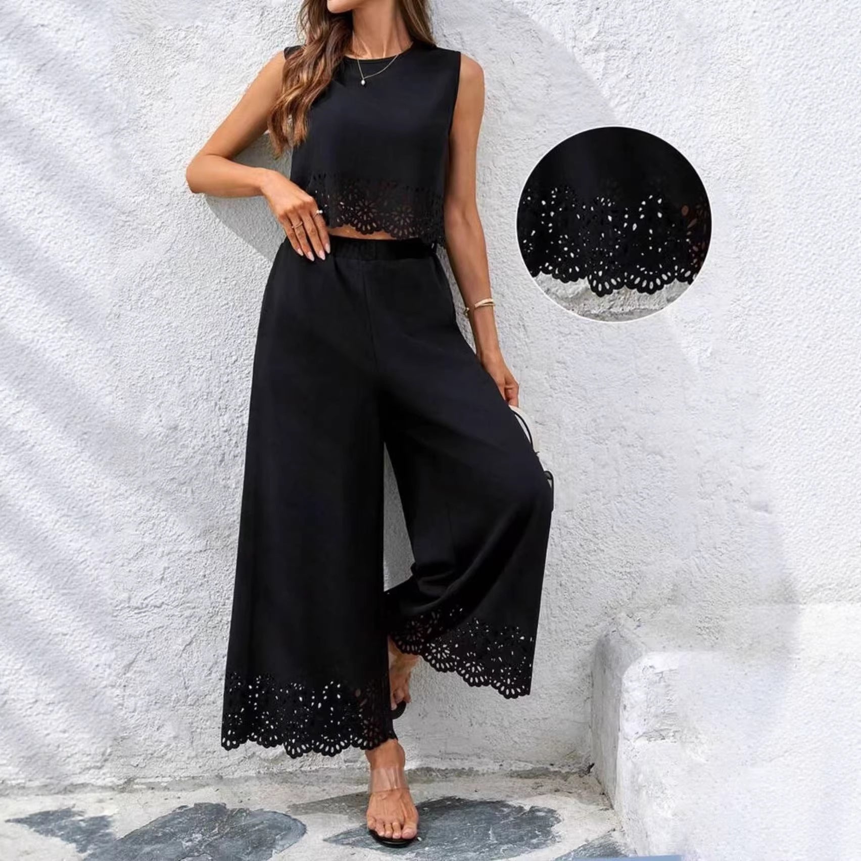 Women's resort-style hollow-out tank top and pants set by Plush Fashion Hub, casualwear with pockets, perfect for relaxed summer days.