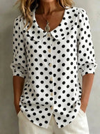 Women's retro polka dot three-quarter sleeve loose cardigan shirt, casualwear by Plush Fashion Hub, shown in a relaxed fit style.