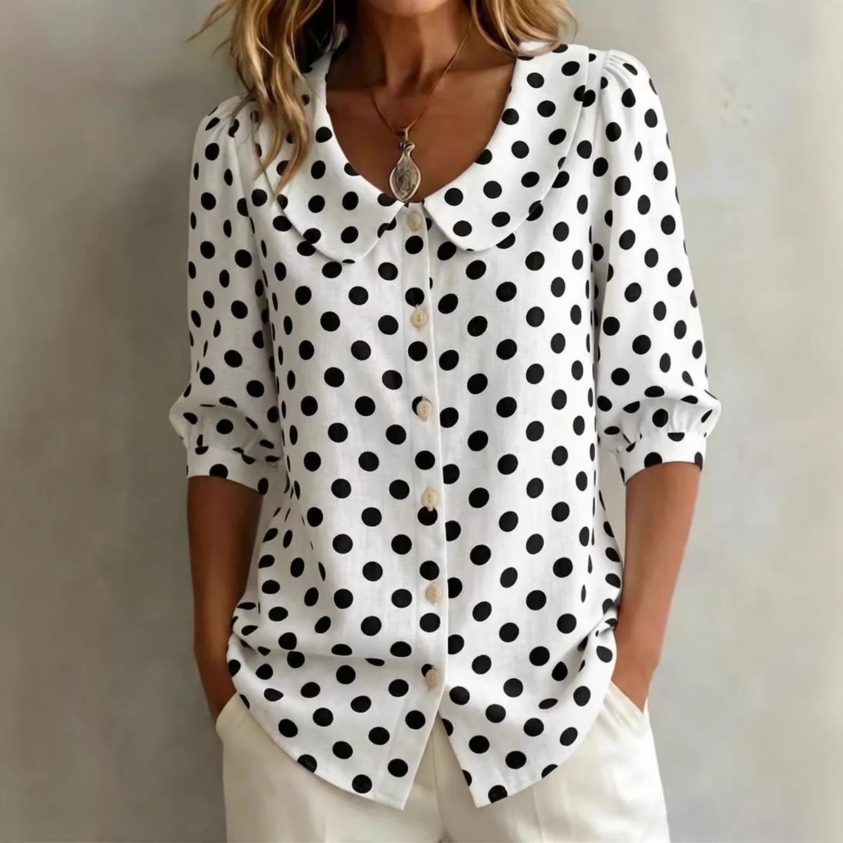 Women's retro polka dot three-quarter sleeve loose cardigan shirt, casualwear by Plush Fashion Hub, featuring a vintage-inspired design.