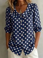 Women's retro polka dot three-quarter sleeve loose cardigan shirt in casualwear, by Plush Fashion Hub, shown in a relaxed fit.