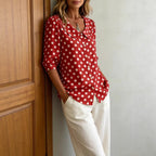 Women's retro polka dot cardigan with three-quarter sleeves, loose fit, casualwear by Plush Fashion Hub.