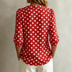 Women's retro polka dot three-quarter sleeve loose cardigan shirt, casualwear by Plush Fashion Hub, with a relaxed fit and vintage style.