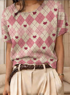 Women’s retro short-sleeve jacquard knit top from Plush Fashion Hub, casualwear with intricate pattern and comfortable fit.