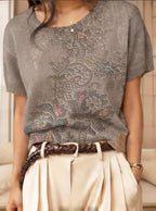 Women's retro short-sleeve jacquard knit top by Plush Fashion Hub, featuring a stylish vintage-inspired design and textured pattern.