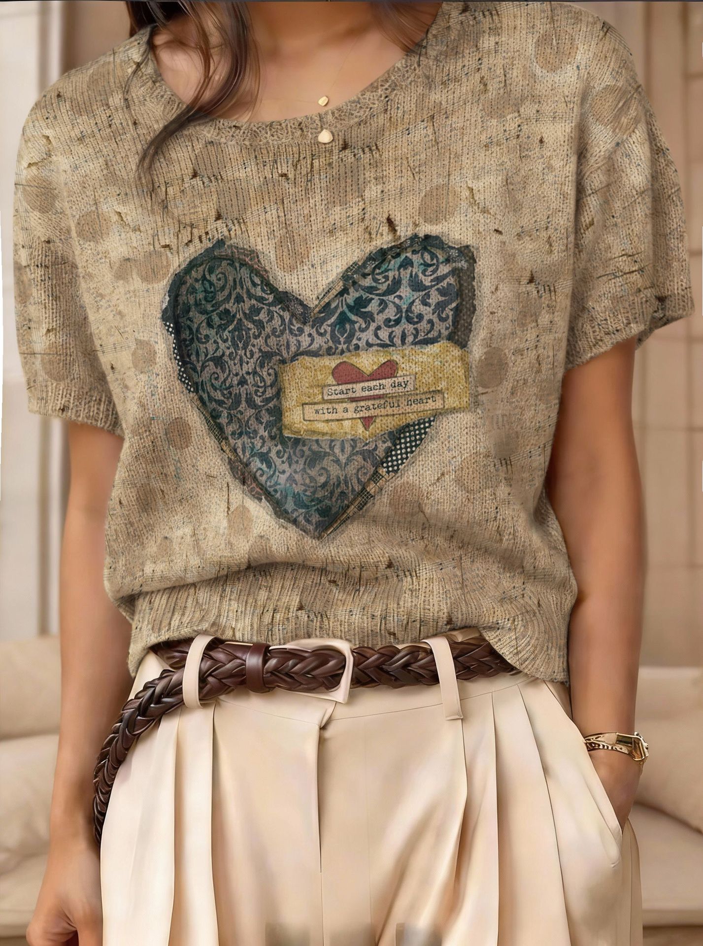 Women’s retro short-sleeve jacquard knit top, casualwear by Plush Fashion Hub, shown in a close-up of the patterned fabric.