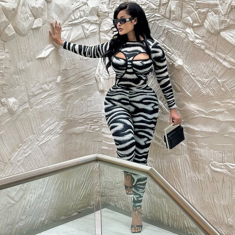 Women's high-waisted jumpsuit with round neck and hollowed-out bustier design from Plush Fashion Hub, featuring stylish pants set.