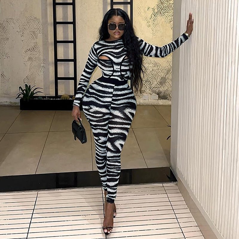 Women's round neck hollowed-out bustier jumpsuit with high-waisted pants, stylish and trendy fashion set from Plush Fashion Hub.