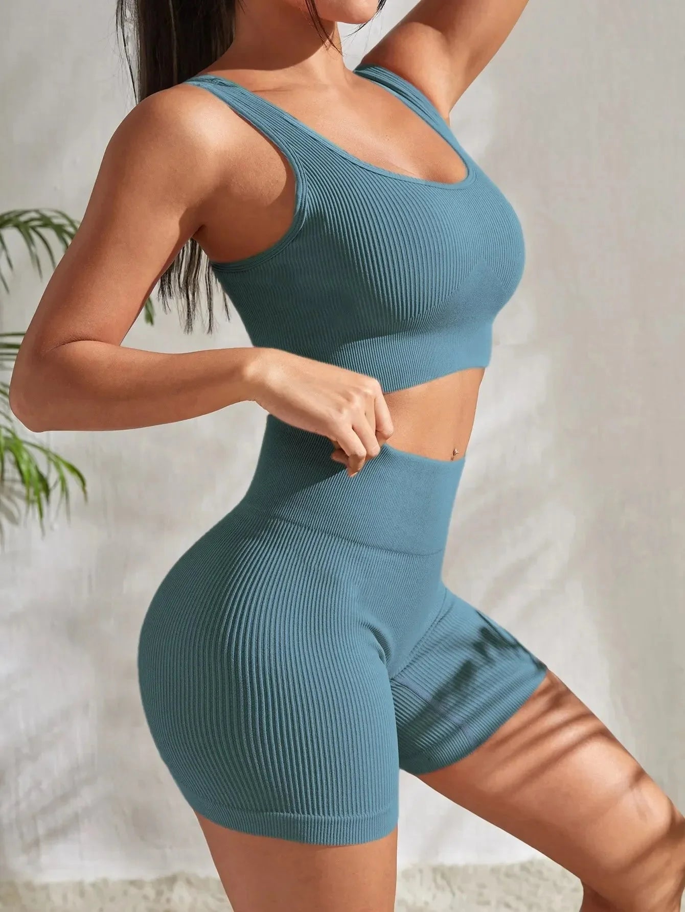 Women’s seamless ribbed yoga set by Plush Fashion Hub, featuring a fitted, comfortable activewear top and matching leggings.