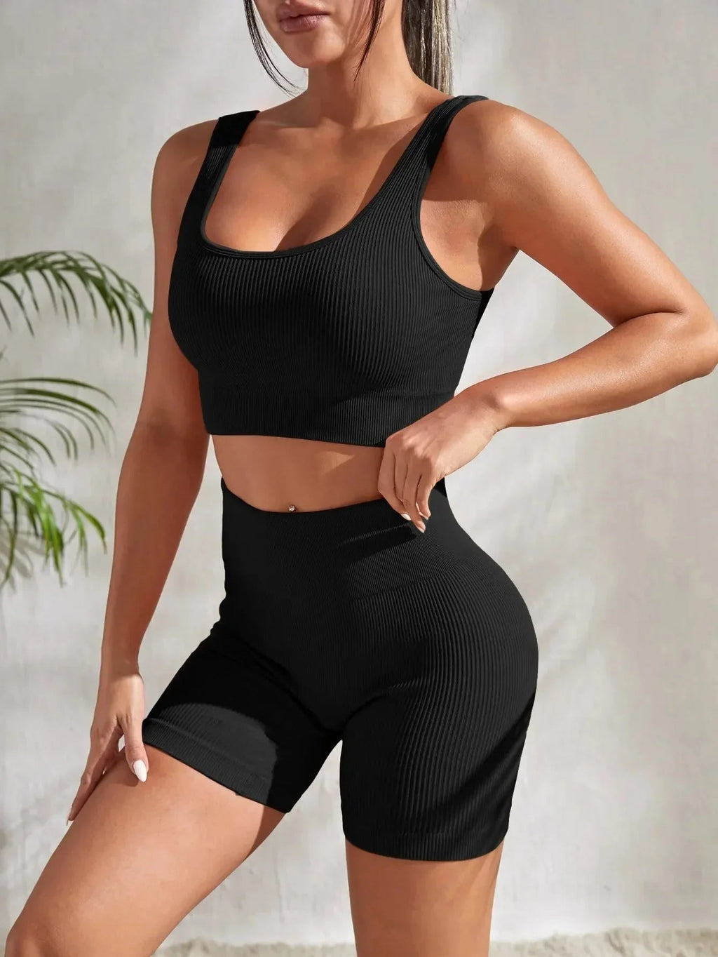 Women’s seamless ribbed yoga set by Plush Fashion Hub, featuring fitted leggings and a matching sports bra for activewear.