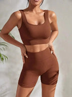 Women’s seamless ribbed yoga set by Plush Fashion Hub, featuring a fitted sports bra and high-waisted leggings in soft, stretchy fabric.