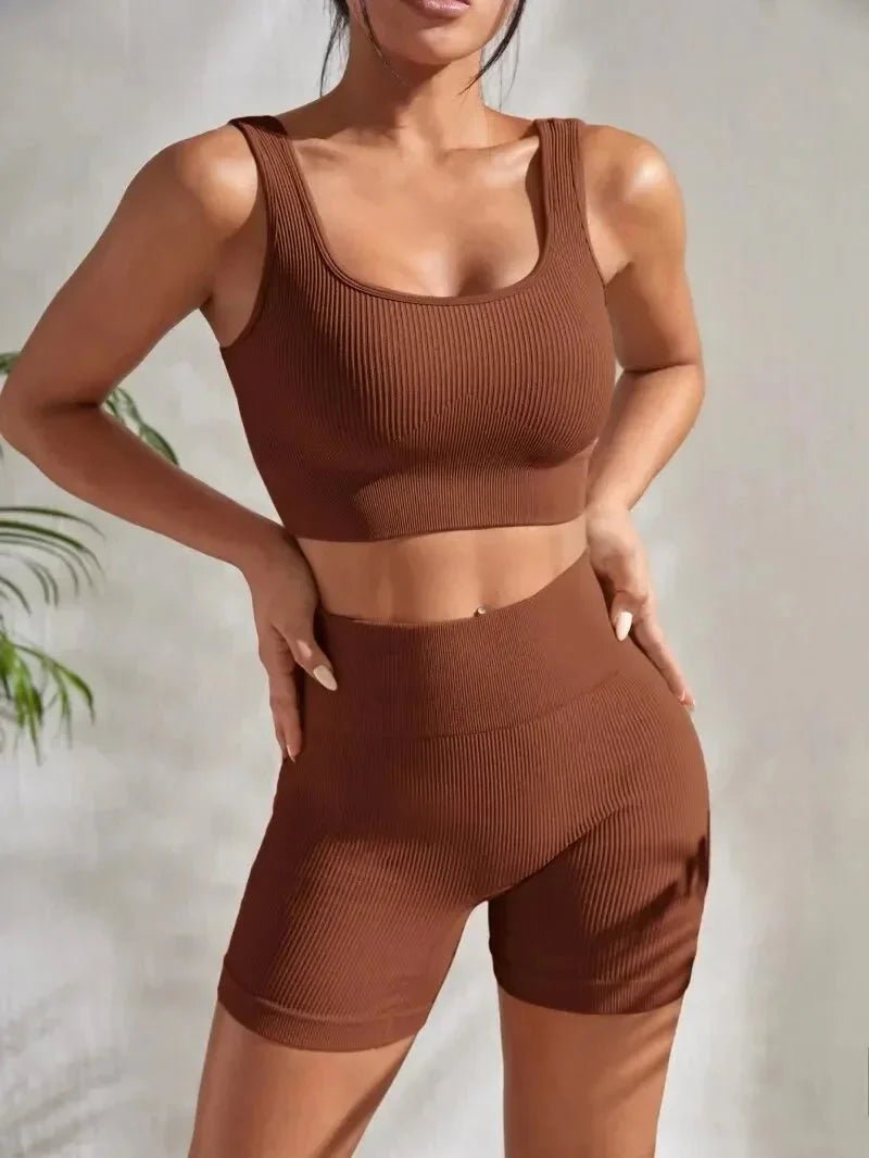 Women’s seamless ribbed yoga set by Plush Fashion Hub, featuring a fitted sports bra and high-waisted leggings in soft, stretchy fabric.