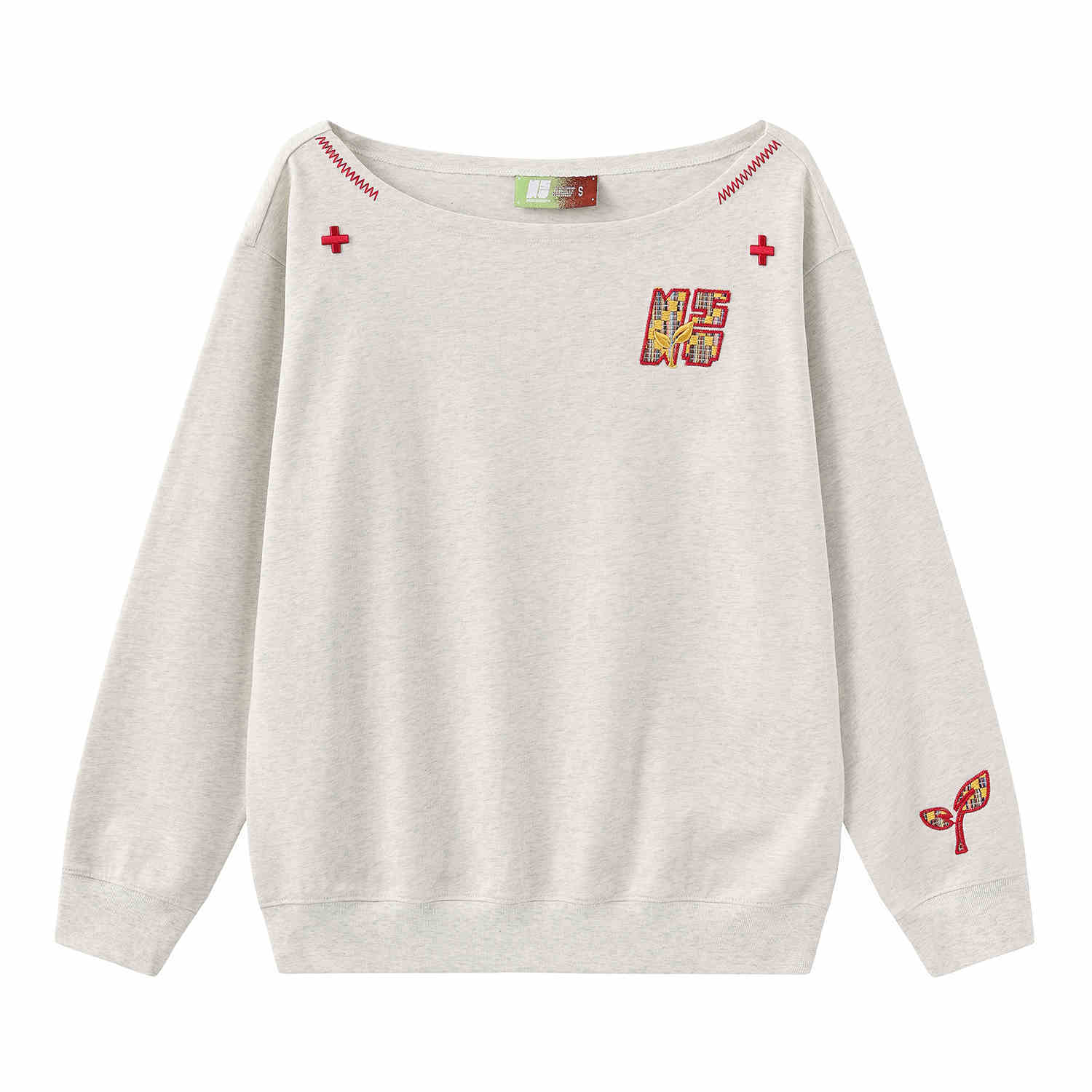Women’s slanted shoulder embroidered long-sleeve casual top by Plush Fashion Hub, featuring intricate embroidery and a stylish design.