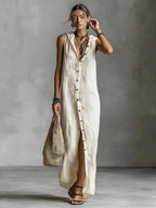 Women's sleeveless deep V-neck hooded loose maxi dress by Plush Fashion Hub in 6 colors, available in XS to 3XL, styled for casual wear.