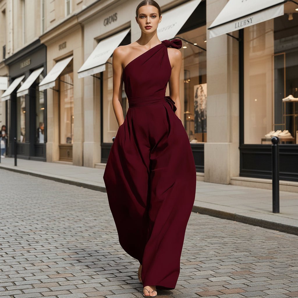 Women's sleeveless halter neck jumpsuit with cinched waist in six colors, available in sizes S to 2XL, by Plush Fashion Hub.