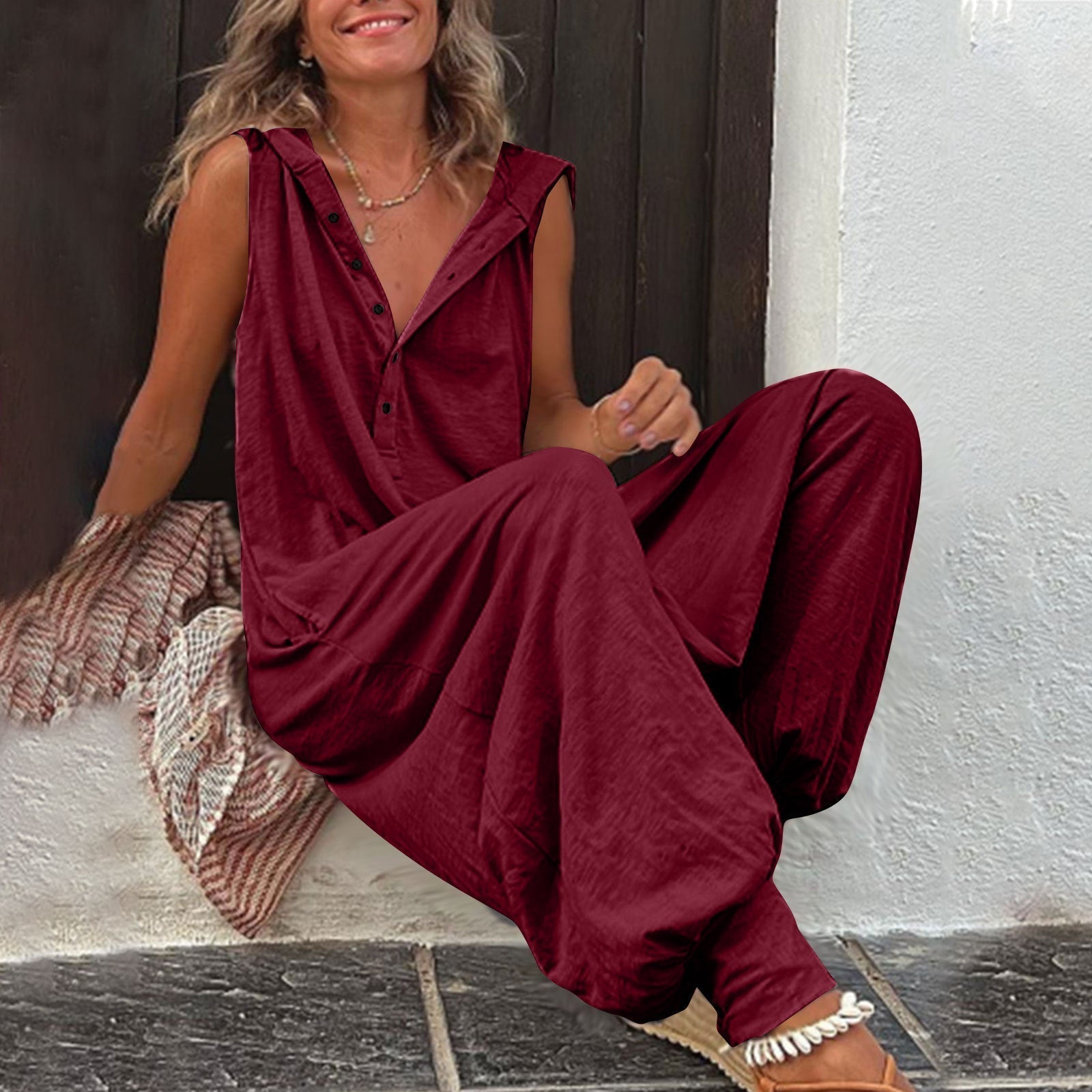 Women’s sleeveless hooded relaxed fit jumpsuit by Plush Fashion Hub, casualwear with a comfortable, stylish design and front pockets.