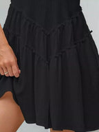 Women's sleeveless round neck mini dress with pockets by Trendsi, featuring a casual fit and stylish design.
